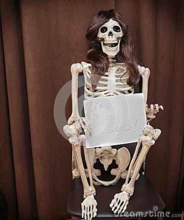 skeleton-wig-sitting-chair-holding-paper-written-message-against-dark-brown-background-45667823